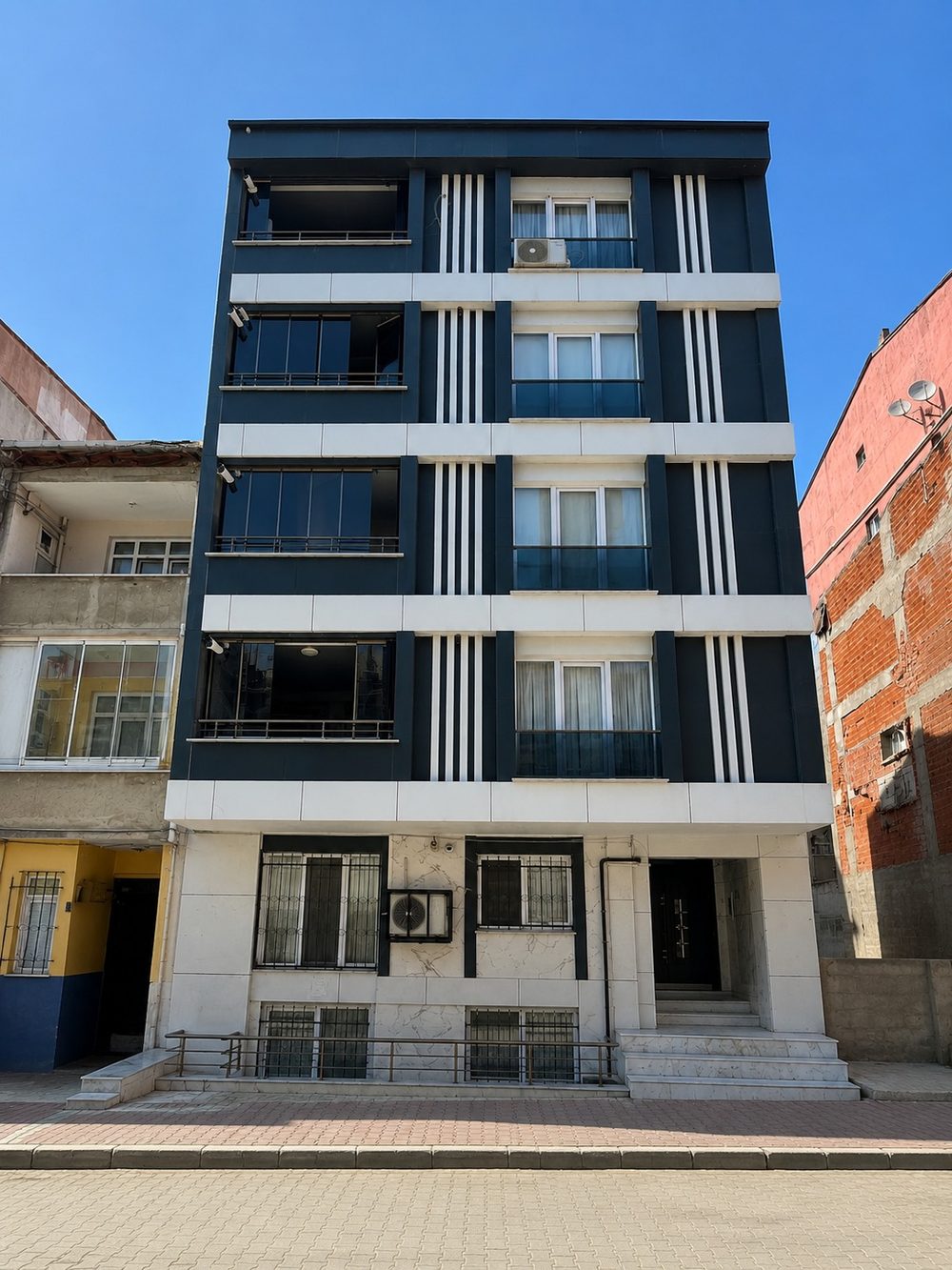 Yiğit Apartmanı - 3010 Ada 11 Parsel